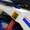 Catadioptre Orange Luxor37/ULO237 Peugeot 103 RCX Chrono Racing - Origine